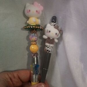 Hello Kitty Kids Charm Multicolor Ink Pens in Yellow.. Reg Ink Pen Gray and Pink